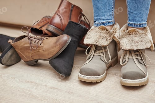 Preview: Woman chooses comfortable shoes among a bunch of different pairs