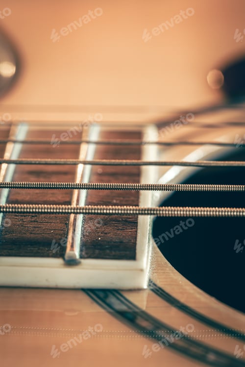 Preview: Strings on a classical acoustic guitar, macro shot.