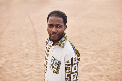 Preview: African American Man in Traditional Patterns in Desert