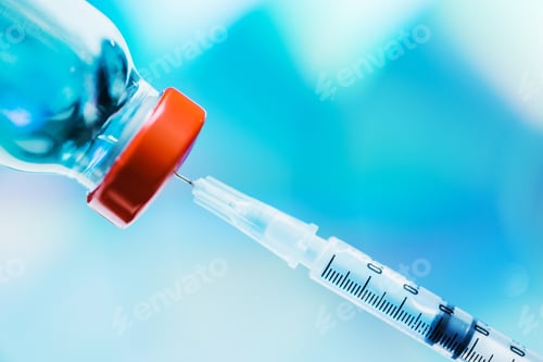 Preview: vaccination concept, vaccine vial with syringe