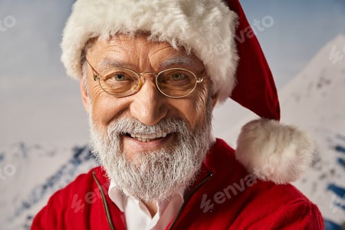 Preview: portrait of happy white bearded Santa in red hat with glasses with snowy backdrop, Merry Christmas