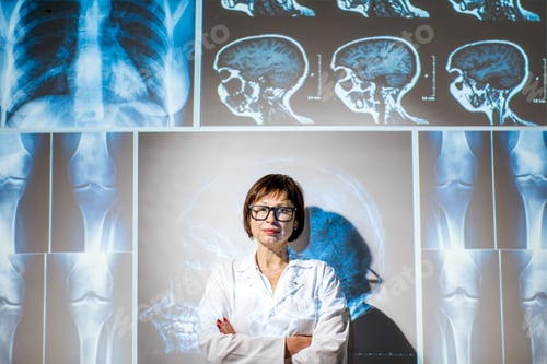 Preview: Doctor on the x-ray of human parts background