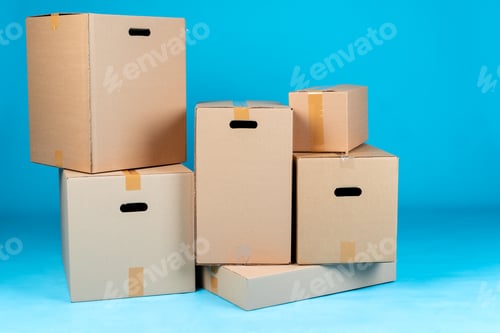 Preview: Stack of cardboard boxes on blue background
