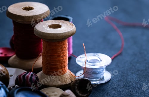 Preview: Bobbins of threads near buttons