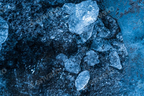 Preview: Ice crystals on textured blue surface.