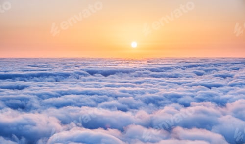 Preview: Aerial view of sunrise above clouds on Madeira island, Portugal