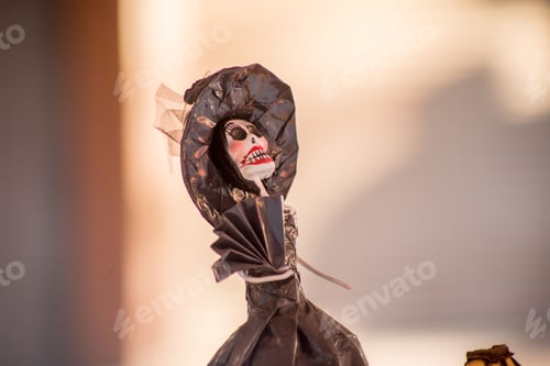 Preview: Small skeleton figurine in a black dress. Day of the Dead in Tlaquepaque, Mexico.