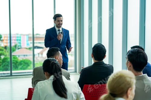 Preview: Group of businesspeople attending a seminar