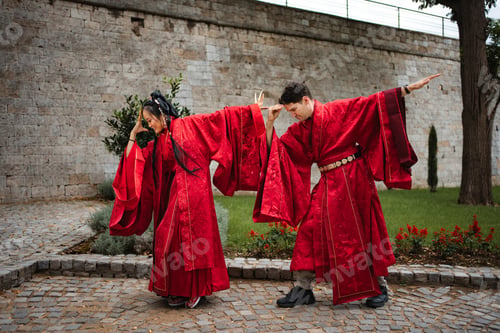 Preview: Happy diverse couple playfully dancing during wedding ceremony