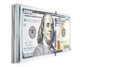 Preview: Stack of One Hundred Dollar Bills on White