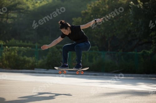 Preview: Skateboarder skateboarding at morning outdoors