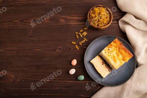 Preview: Сottage cheese Сasserole, Curd cake, with dried apricots and raisins on brown wooden