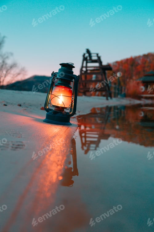 Preview: Blue lamp next to a lake