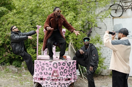 Preview: Posing with Pink Leopard Print Cart Outdoors