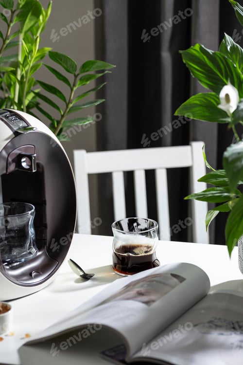 Preview: Coffee machine and cup of espresso