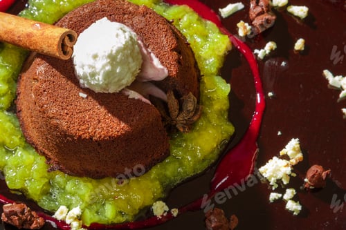 Preview: Closeup of a chocolate muffin with fruit mousse