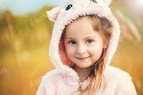 Preview: Closeup portrait of brown-eyed five-year-old girl