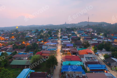 Preview: Aerial top view of houses in Mon village, Kanchanaburi, Thailand in urban city town in Asia