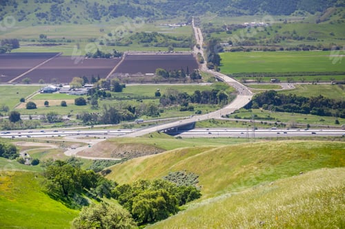 Preview: Aerial view of freeway junction and agricultural fields
