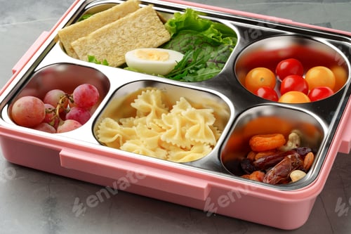 Preview: Lunch box with ready food on gray background