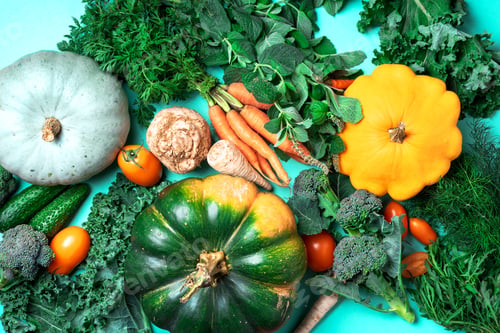 Preview: Autumn vegetables on trendy green background. Top view. Vegan and vegetarian diet, harvest concept