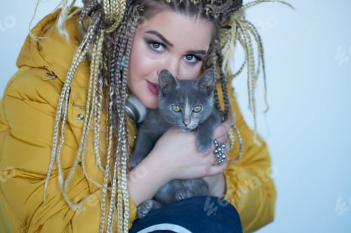 Preview: Tween Girl playing with small Gray kitten