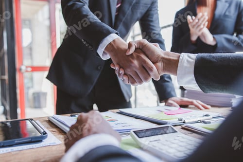 Preview: Business handshake for teamwork of business merger and acquisition,successful negotiate,hand shake,
