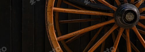 Preview: Close-up shot of a wooden wheel of a horse carriage