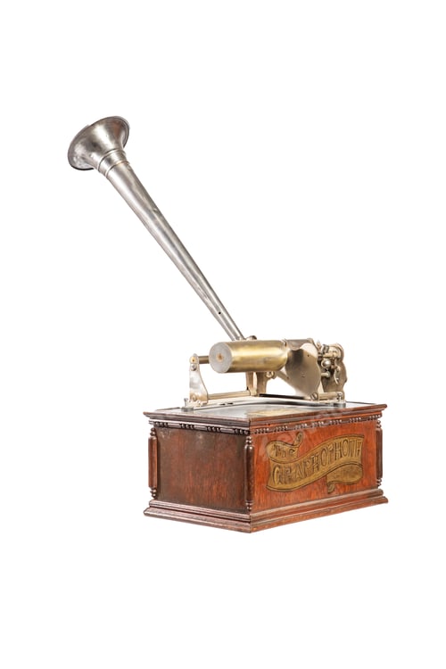 Preview: Old gramophone with plate or vinyl disk on wooden box isolated on white background.