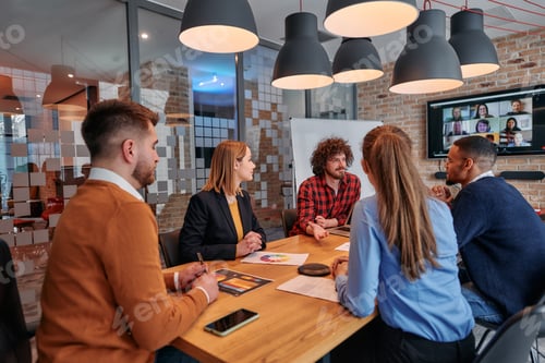 Preview: In the vibrant ambiance of a modern startup office, a diverse team of business professionals engage