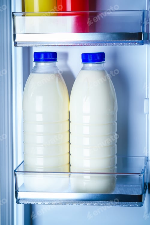 Preview: Bottles of milk in the fridge