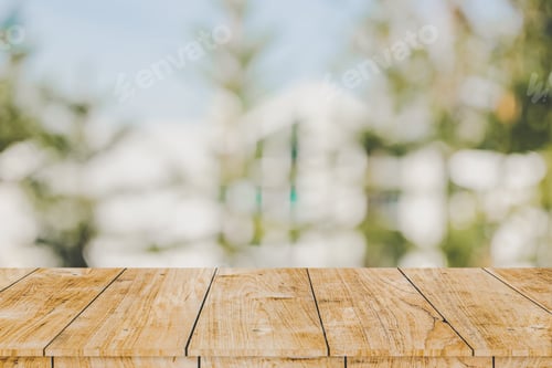 Preview: Wooden table space with green home backyard outdoor blur background for advertising montage template