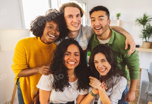 Preview: Group of young tourists standing at youth hostel guest house Happy multiracial friends booking home