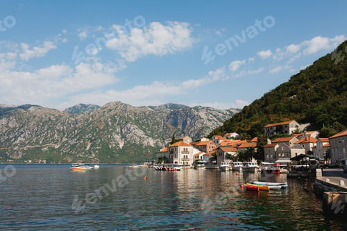 Preview: Boats on the pier of Perast against the background of mountains. Montenegro