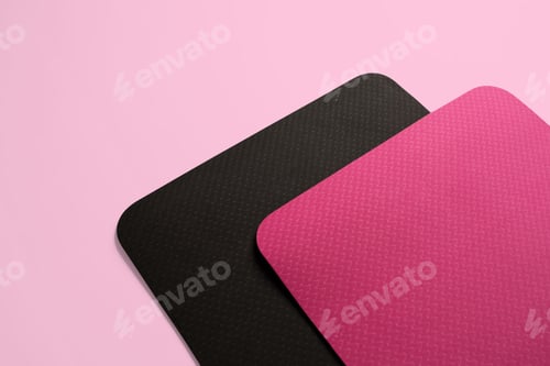 Preview: Closeup shot of two fitness mats isolated on a background