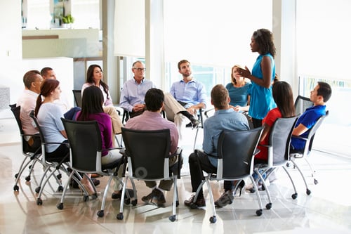 Preview: Businesswoman Addressing Multi-Cultural Office Staff Meeting
