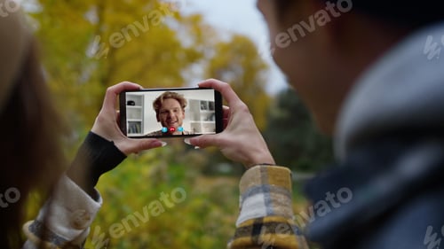 Preview: Young people video calling friend closeup. Happy family enjoy distant conference