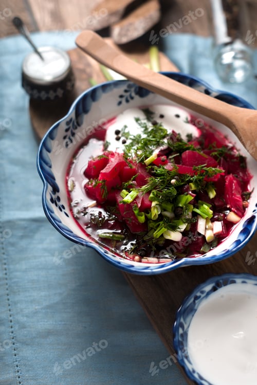 Preview: Cold Beet Soup Garnished with Dill and Green Onions
