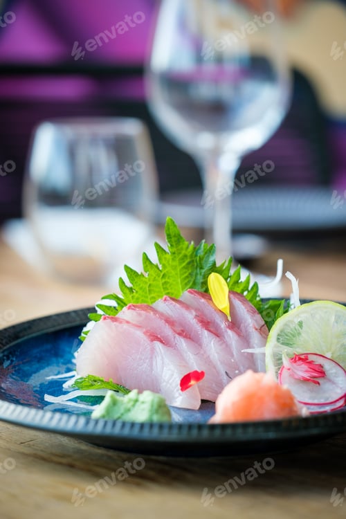 Preview: Japanese amberjack sashimi dish in restaurant