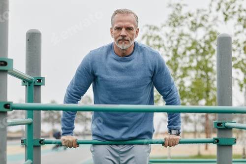 Preview: Motivated Senior Man Working Out Outdoors