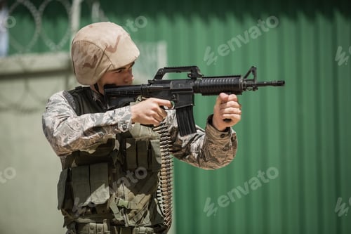 Preview: Military soldier aiming with a rifle