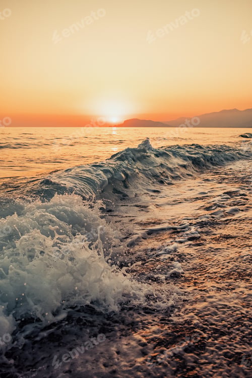 Preview: Scenic orange sunset on the beach