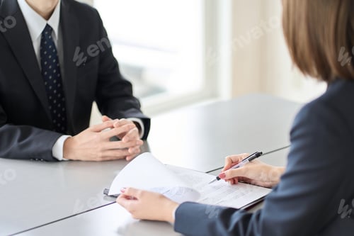 Preview: Hands of a woman conducting a business interview