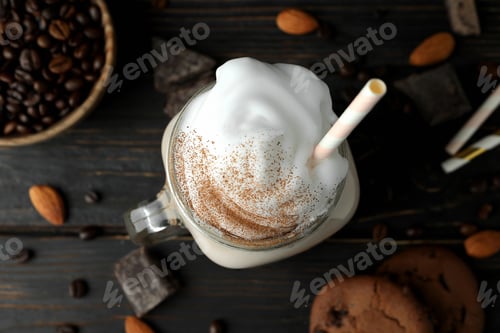 Preview: Concept of delicious food with chocolate milkshake on wooden table