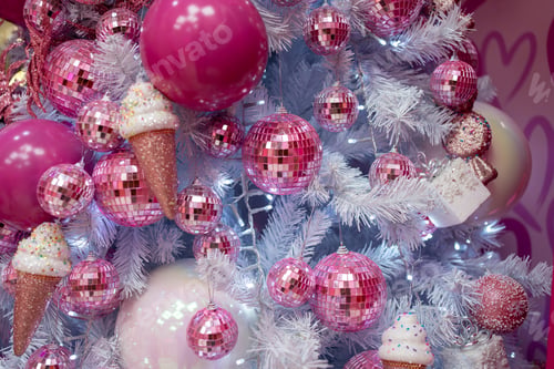 Preview: Shiny pink baubles and ice cream cones hanging on Christmas tree
