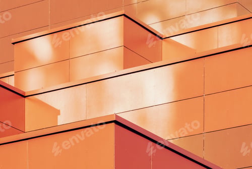 Preview: Orange colored geometric background of metal building facade