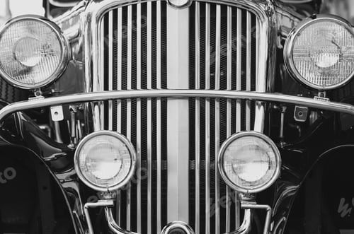Preview: Front headlights with sparkle chrome of the old vintage classic car in black and white style