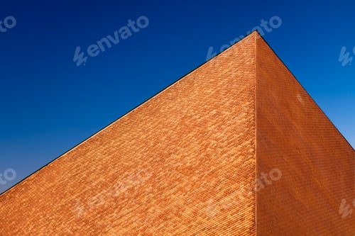 Preview: A building against a celestial gradient during sunset. Sky color gradient as a background.