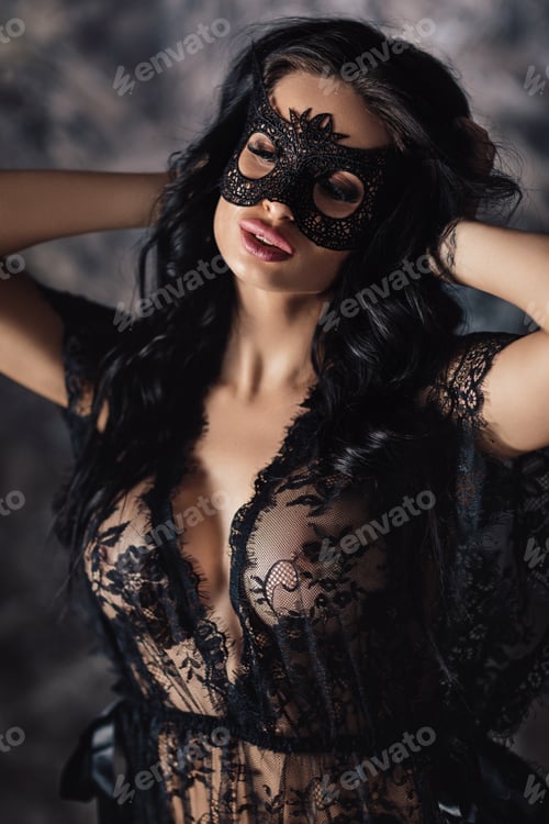 Preview: portrait of sexy beautiful woman in lace lingerie and carnival mask