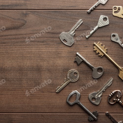 Preview: Many Different Keys On Wooden Table